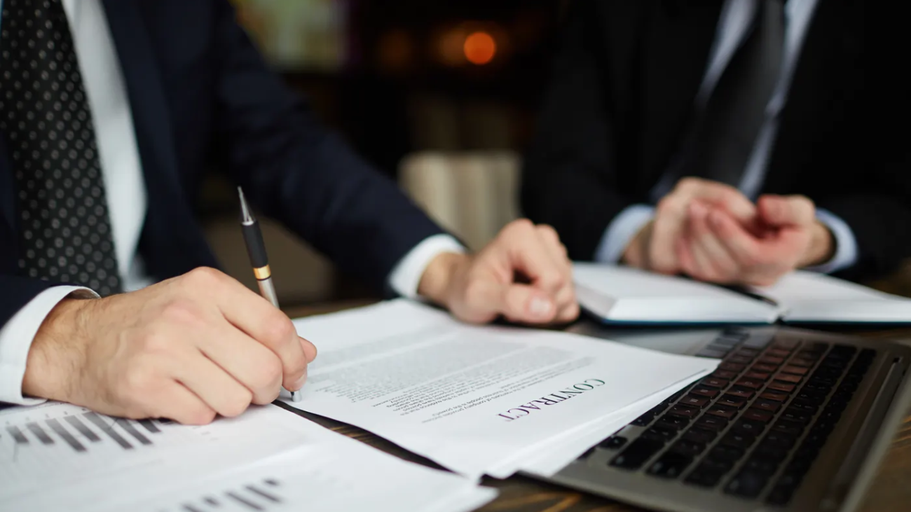 businessman-reading-contract-closeup
