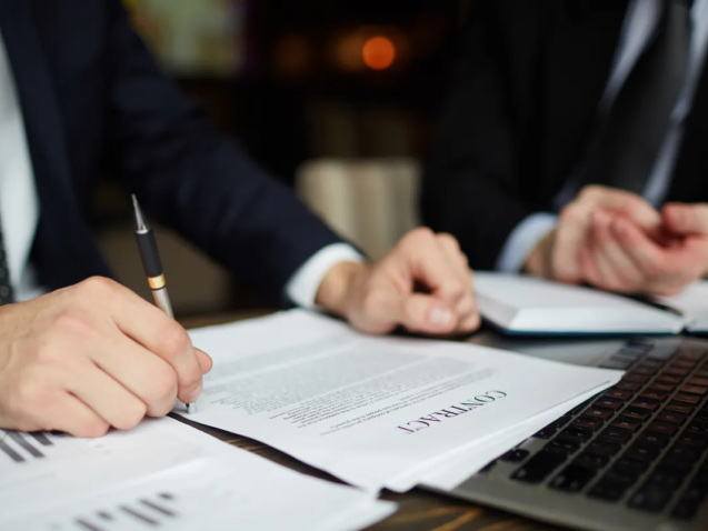 businessman-reading-contract-closeup