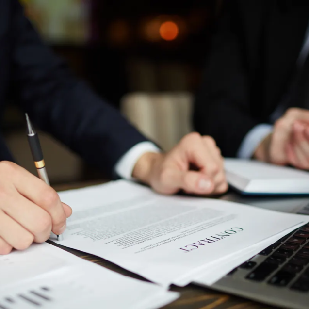 businessman-reading-contract-closeup
